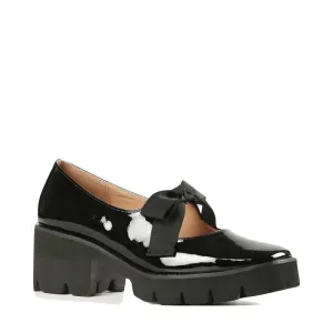 ALL BLACK Footwear Women's Tap & Lugg Bow Mary Jane in Black Patent