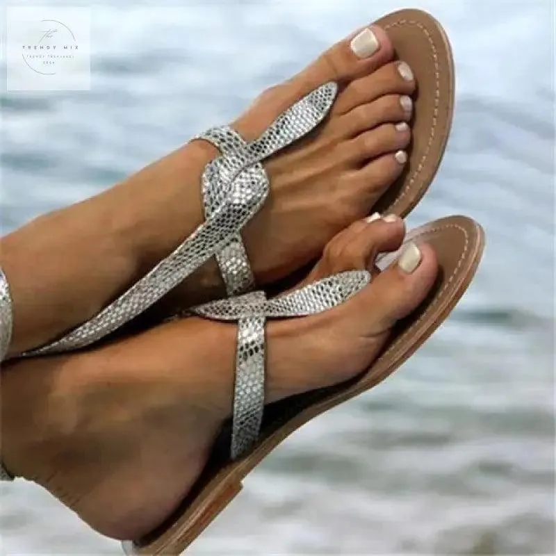 Sleek Snakeprint Roman Flat Sandals for Women - Summer Comfort